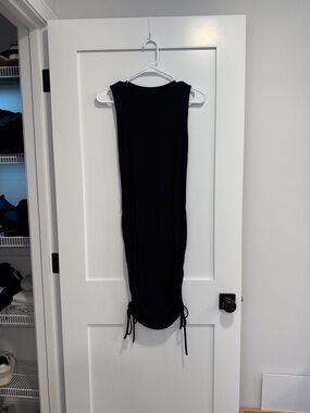 Black short dress cinched on sides